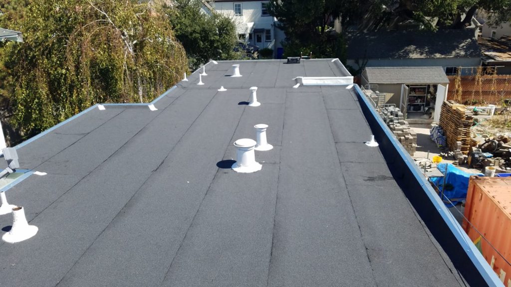Torch down on SBS System Elite Roofing & Waterproofing Inc